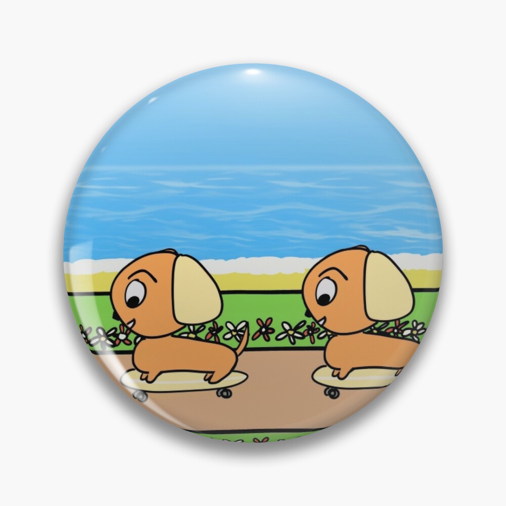 Cute chibi pups on skateboards by the beach pin badge